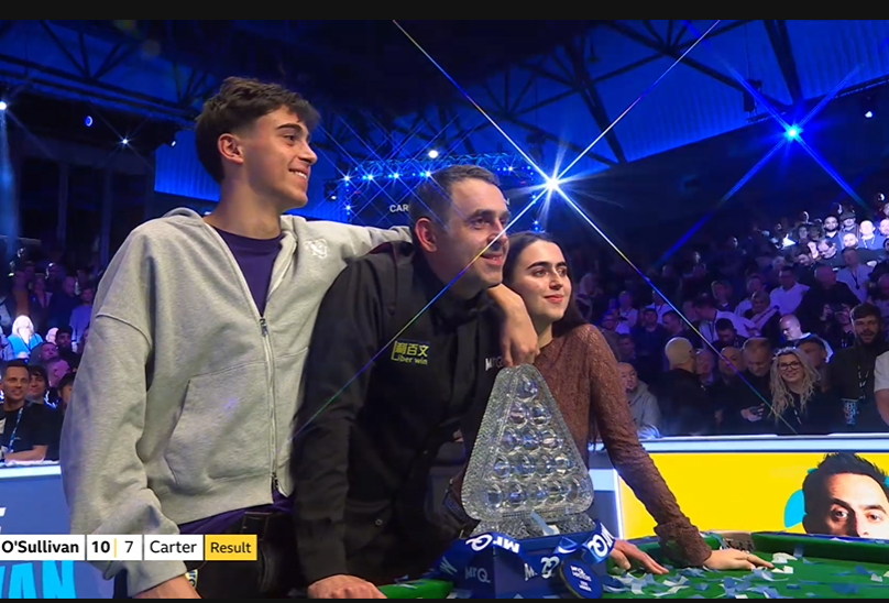 2024 Ronnie Wins Masters with children.png