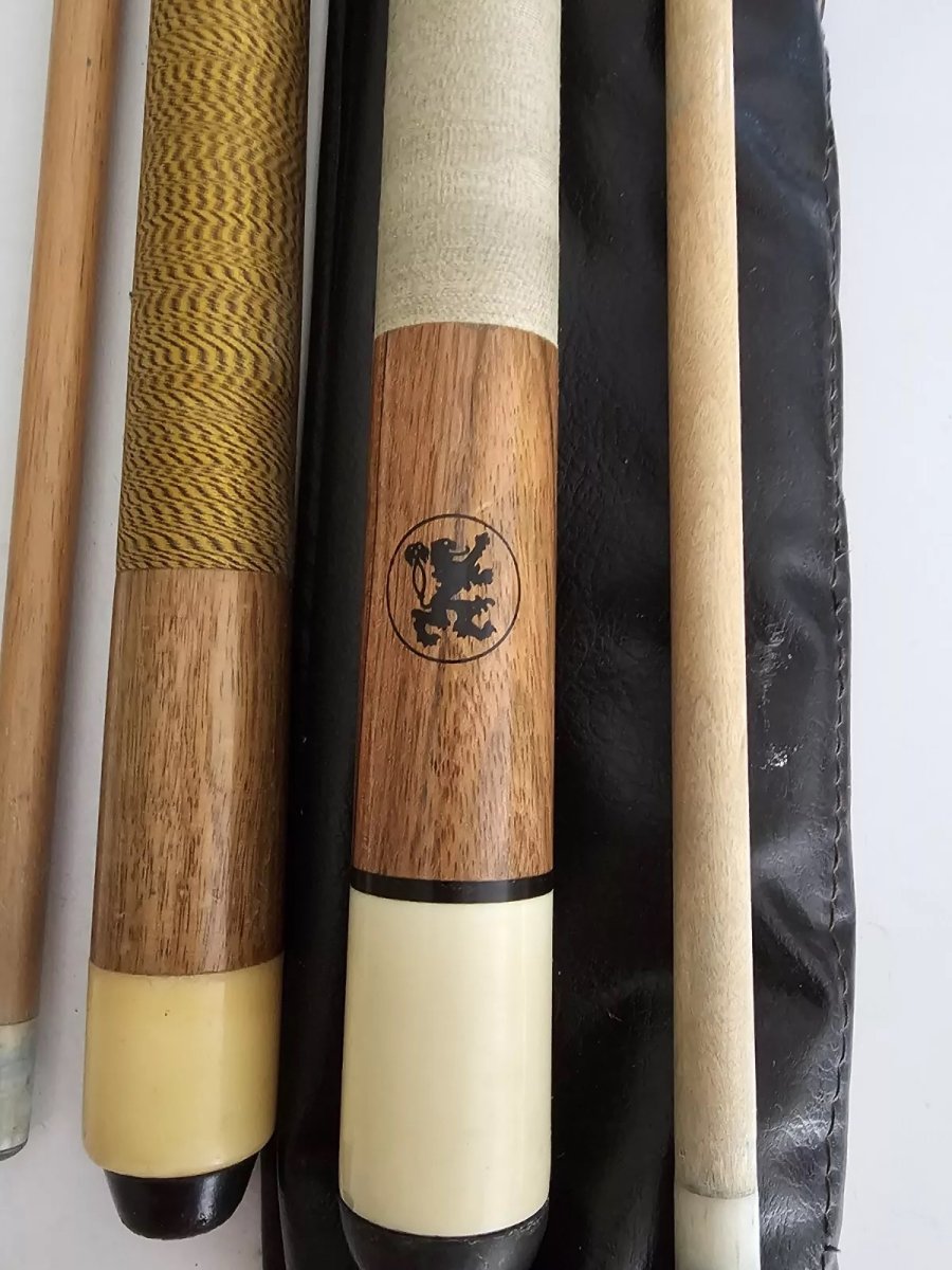 Is eBay selling an Adam cue, a forgery, or a no-name cue? Is