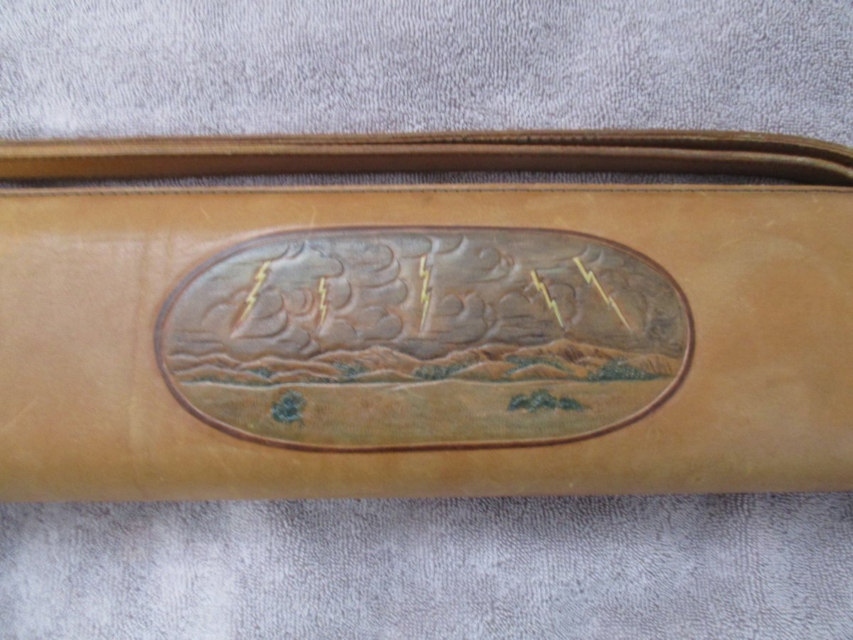 carved picture on case.JPG