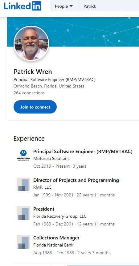 Pat Wren with photo.JPG