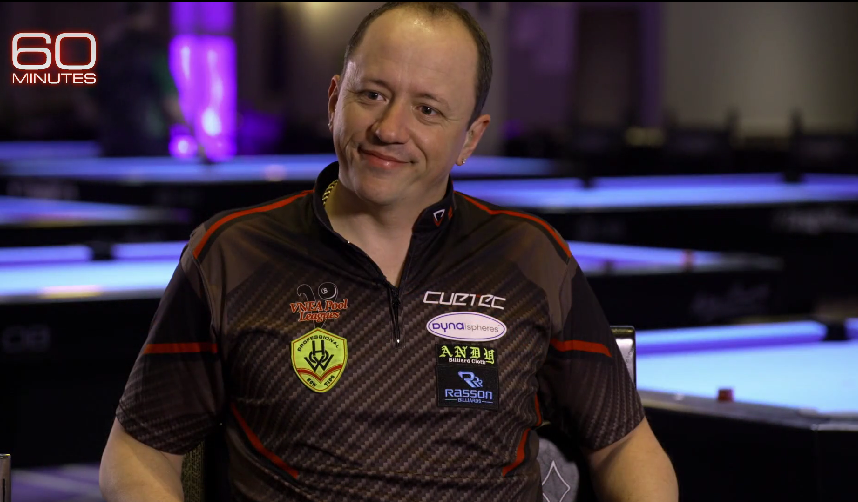 Shane with sponsor patches.png