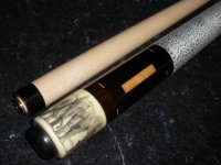elephant scrimshaw cue.jpg