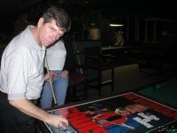 1350 McC holding Schon & signing C of M poster.jpg
