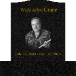 front of wade's tombstone.gif