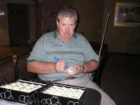 buddy hall signing balls.JPG