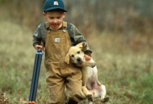 kid-and-dog-and-gun-380x260.jpg