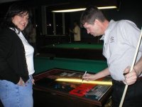 Keith signing TCOM poster.JPG