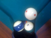 billiard balls hung in pocket 800x600.jpg