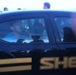beer in sheriff car.jpg