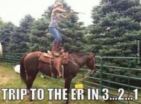 Standing on horse.jpg