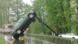 crash_car_leans_pole.jpg