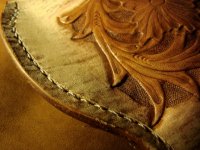 cue case-stitching up-close.JPG