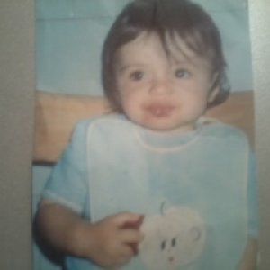 Myself beeing 2 years young and discovering my first tomatoe (Al Capoolino)