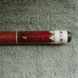 DSC07649 1 butt sleeve of curly koa cue with synthetic inlays and lettering in sleeve and butt cap.