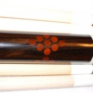 1995 Dave Tice. 
Dave made the cue for me in 95, 
The rack of nine in the butt is African Padauk and ebony.
The butt cap is Delran, its original,  Too