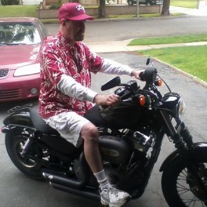 Harley Nightster,runs strong.Sometimes to much for the old Hitman!!!
