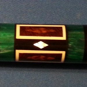 1371962556352two emerald rings snake wood (diamond inside rectangle) ivory surrounding and ivory butt and ivory ring below wrap and 4 mop diamods inla