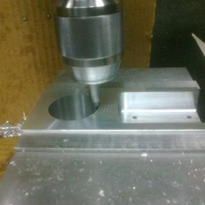 Flipped block over , leaving the same face against the vice jaw, so only need to find the hole center, in X (long axis). Y has not changed, C' bore to