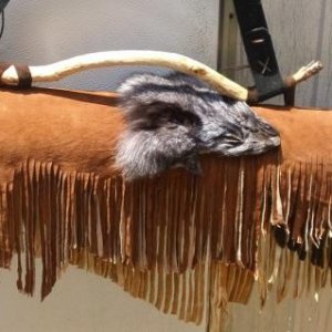 The Woodland Primitive collection has genuine fur as part of the case embellishments. this case is a 3 X 6 with a solid cedar base, branded design, cu