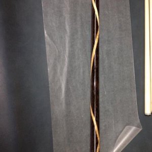 The only photo I have of the hardest cue I ever built.  This was all black palm, and spiraling 2.5 revolutions across the entire butt section is 2 pie