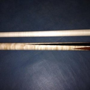 This is a jump cue I made to match a shooter for Ryan Sauer.  Birdseye Maple with ebony points, and smaller redwood burl points.  Another cue that jum