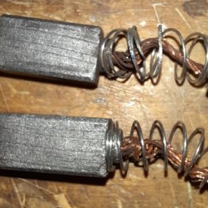Bottom one is longer.  Top is shorter AND a broken spring.