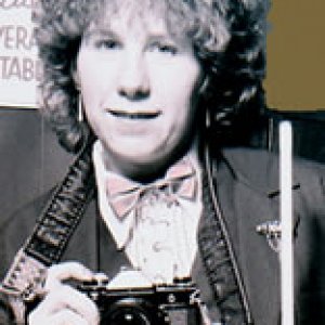 Billie Billing with trusty Canon camera 1980