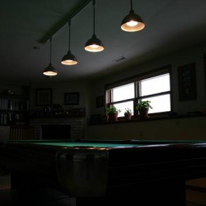 Retro can lighting.  I installed a remote control dimmable switch to mate with the halogen bulb based track lighting system.  Next step is to replace 