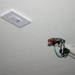 Here I'm showing the nifty remote dimmer switch, which also has a manual function which proved rather necessary because one week after I got all this 
