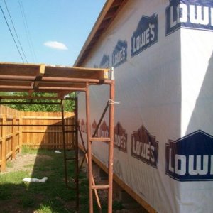 0023
Installing the house wrap