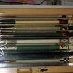 Meucci display case with cues