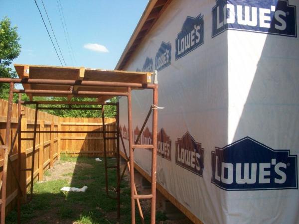 0023
Installing the house wrap