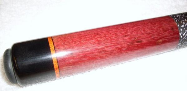 1992 Dave Tice. 
Purple heart with African Padauk rings. 
Cue refinished by Dave Jones custom cues