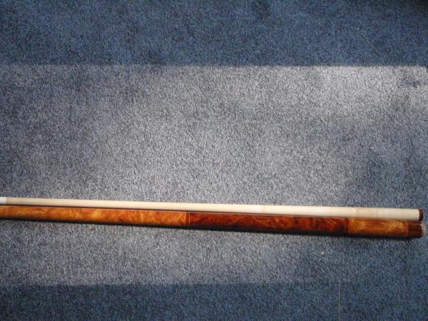 AFZALIA FRONT,AMBOYNA HANDLE,SNAKE WOOD RINGS.