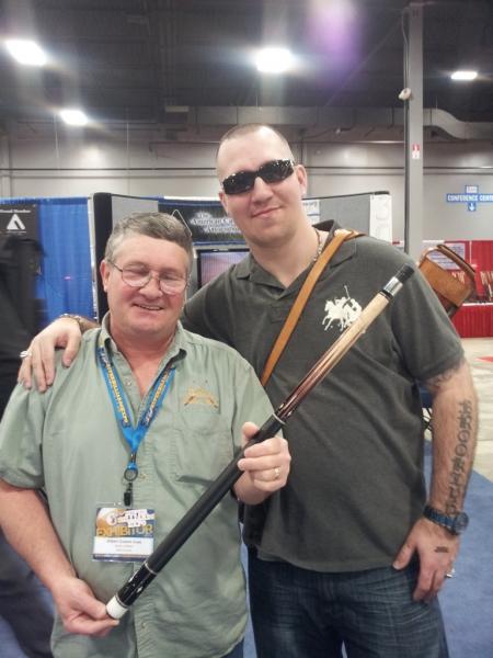Andy Gilbert and I holding his first 8 point cue he made in 2001 at the SBE 2013