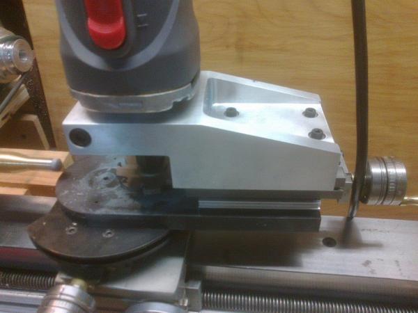 Assembled unit with router and 8 wing cutter, set to penny radius.