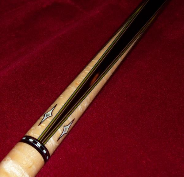 Blue, green, purple, black, and silver veneers. By the way, that spot on the forearm isn't a glare, I asked Mike to find a piece of ebony with a few s