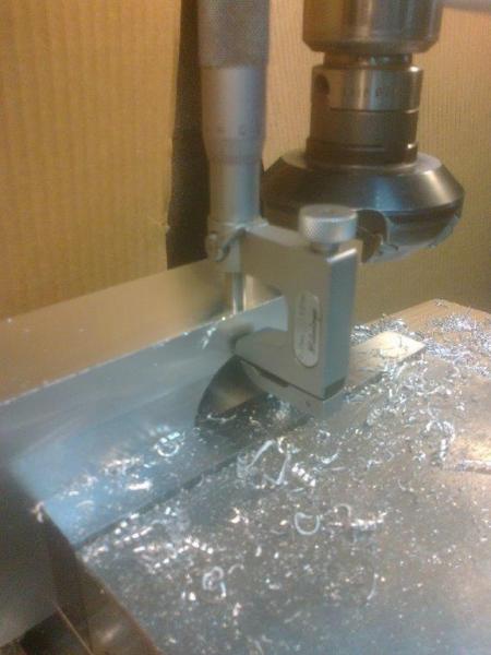 Centralizing the router mount hole to the width of the mount block, using a Universal mic to check the wall section.