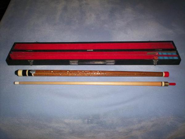 ChampionshipCue; this was my very first cue, it was a christmas present from my mom in December 1974, it had a screw on tip, in 1987 Wayne Gunn put a 