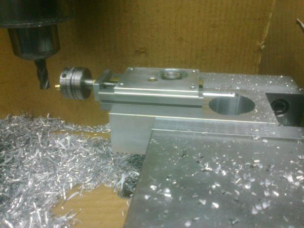 Checking the fit of the Taig slide into the bottom side of router mount.