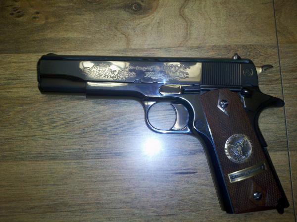 Colt Commemoritive from the 60s.The bluing was flawless and never a mal function........................