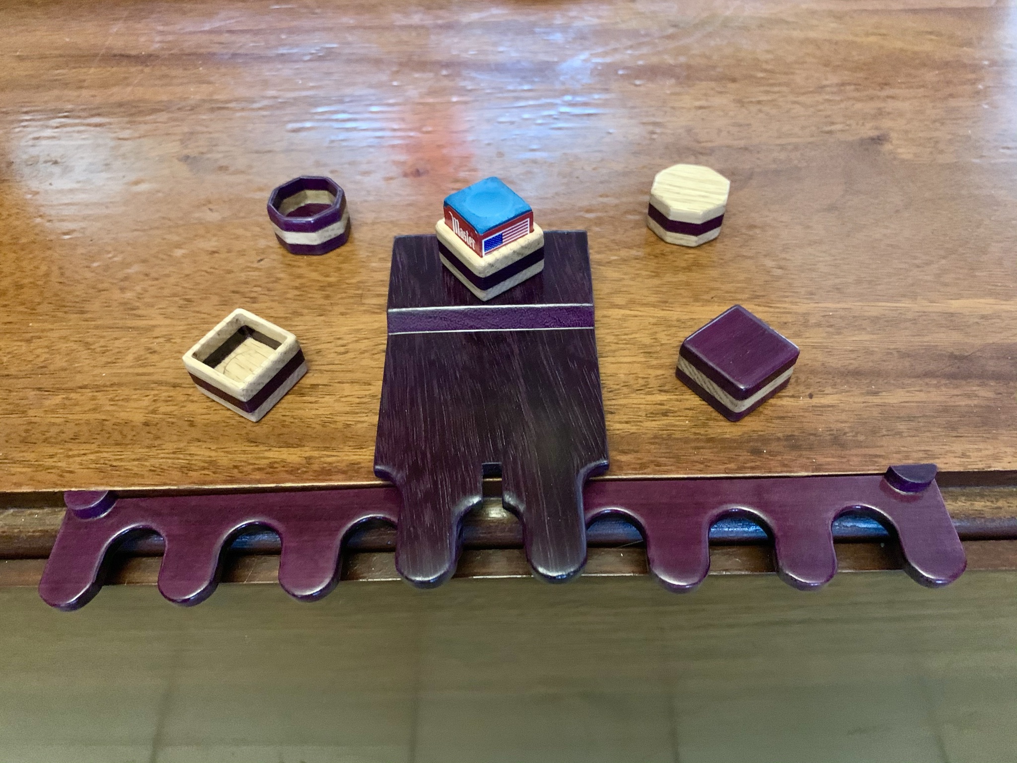 Cue rest and chalk holders