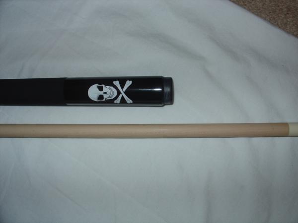 Design on butt of Cuetec youth cue