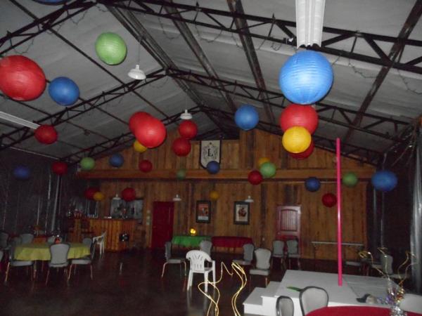 Everyone needs a bar and a pink stripper pole in their pool rooms