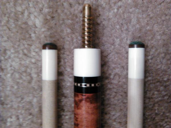 flat faced ivory sleeved joint.  brass radial pin.  2 ivory ferruled shafts