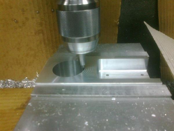 Flipped block over , leaving the same face against the vice jaw, so only need to find the hole center, in X (long axis). Y has not changed, C' bore to