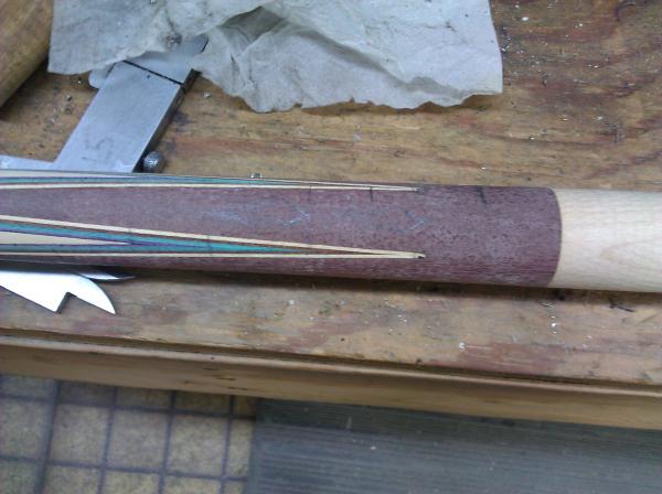 Forearm halfway through with inlays sketched