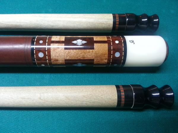 Gina Cue Butt with 4 Snake wood windows and Mother of Pearl inlays inside the windows.  Total of 16 Mother of Pearl inlays on the ring top and bottom 