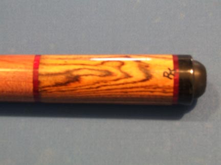 Highly figured Bocote butt. The rings are 50 year old phenolic!!!!