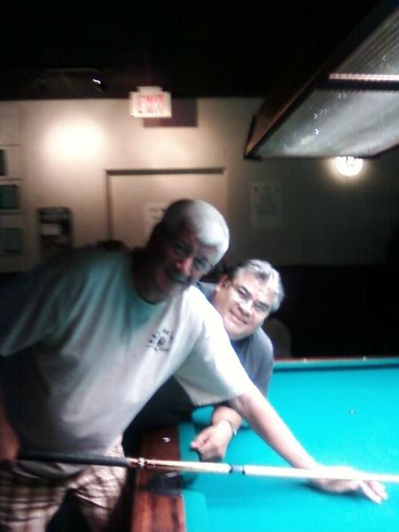 Me and Chuck.. My friend and owner of Charlies Cues. Come on down and bring the Cue. Plenty of hungry people there to give or Take,